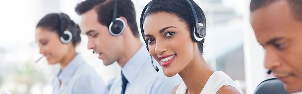 Inszone Insurance Contact Us Page Banner - Employees Taking Calls
