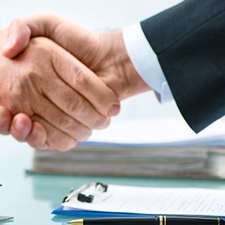 Inszone Insurance Property Insurance Page Banner - Corporate Man Shaking Hands with Man with Safety Hat