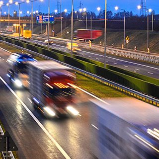 Inszone Insurance Transportation Page Banner - Busy Expressway with Vehicles