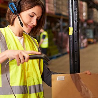 Inszone Insurance Wholesale & Distribution Page Banner - Warehouse Worker Using Barcode Scanner